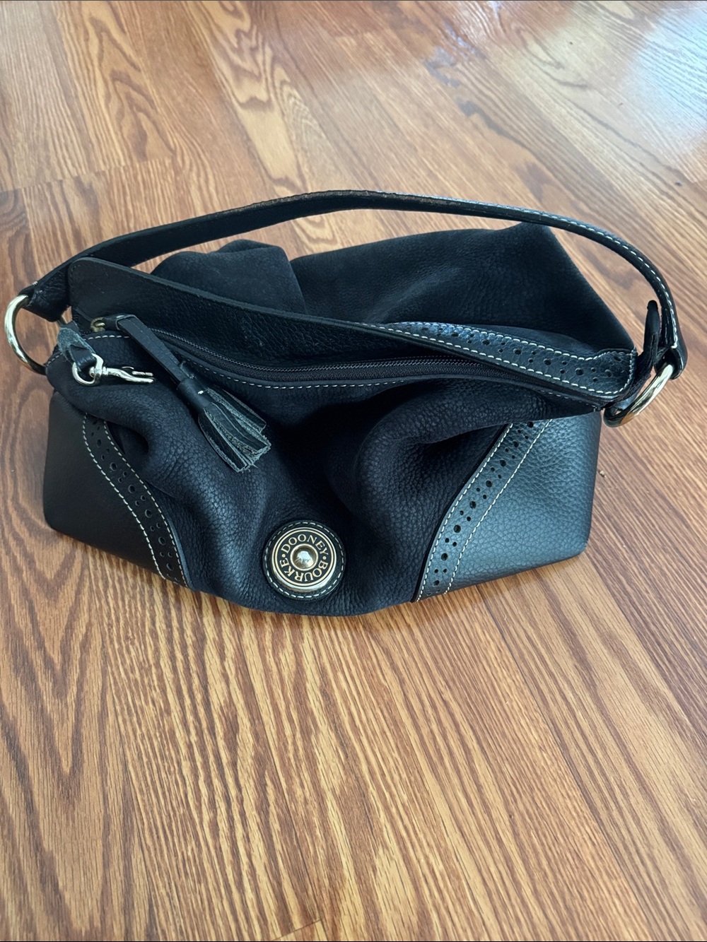 Dooney & Bourke Black Pebbled Leather Shoulder Bag with Tassel Zip Pull